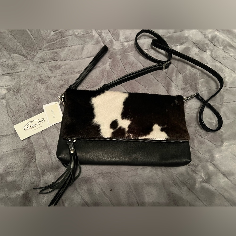 Odessa cowhide fold over clutch